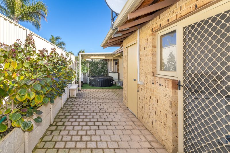 Sunny Yard and Vibrant Village Lifestyle