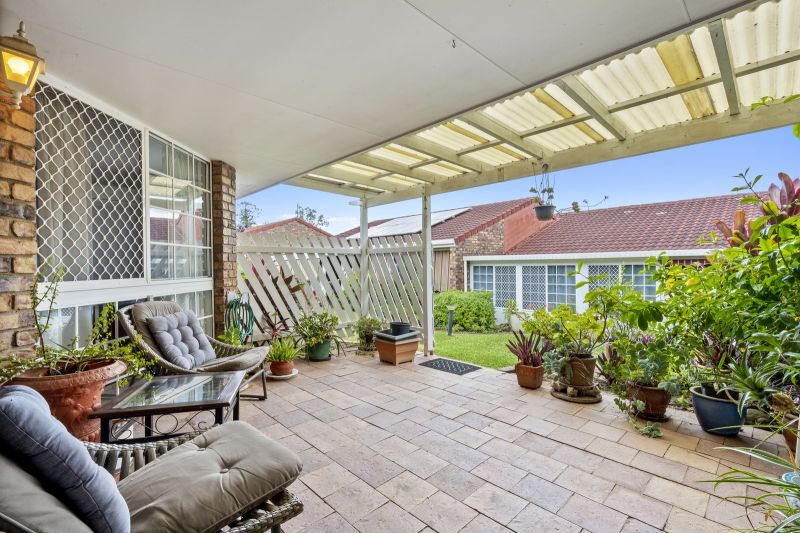 Beautiful two-bedroom, one bathroom villa with covered rear entertaining area.