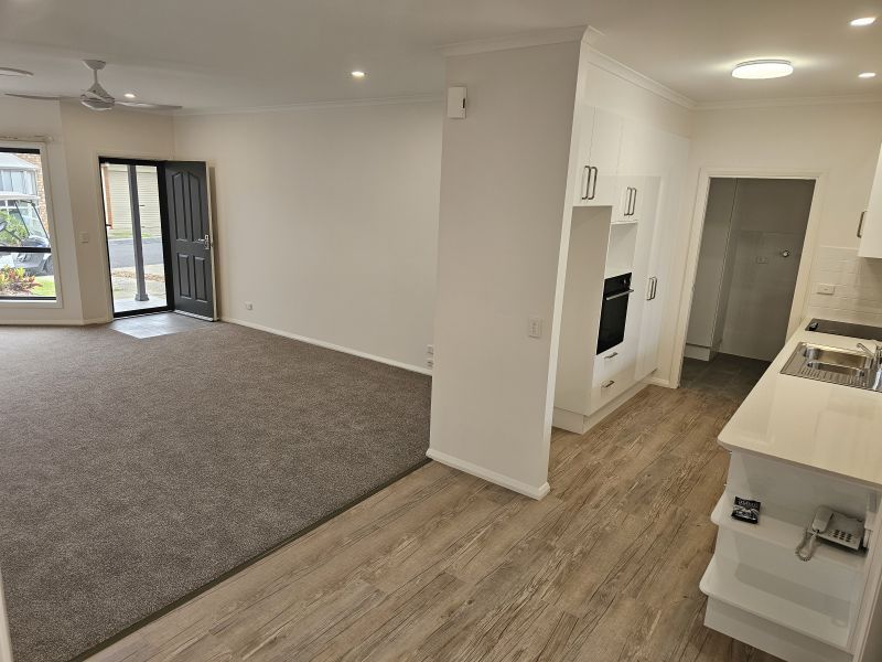 2 Bedroom + Sunroom and QLD room. North facing Lounge.