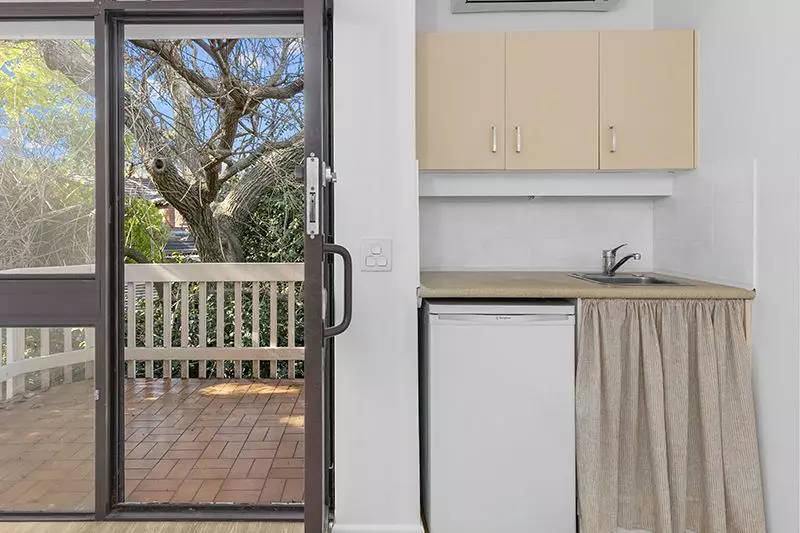 A private and quiet retreat overlooking lush green gardens. 