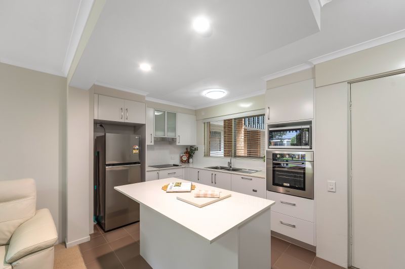 Secure Parking, Low Maintenance Unit Ground Floor Living with Modern Finishes!