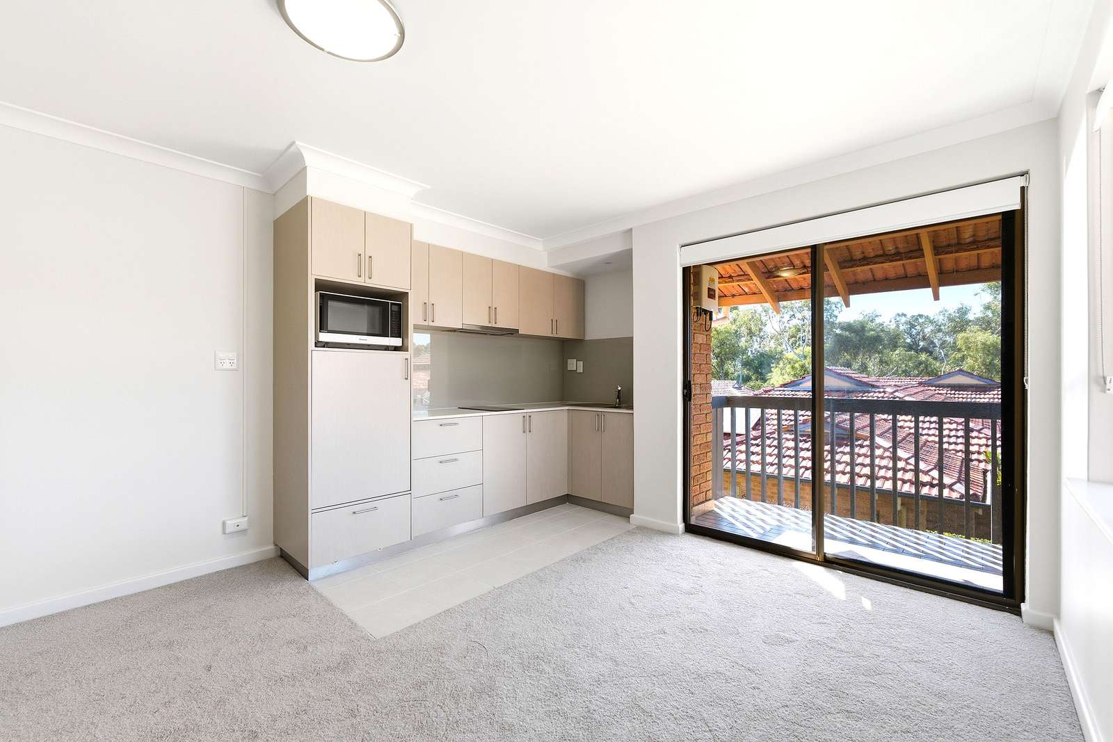 Bright corner apartment close to village amenities