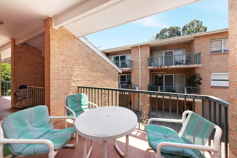 SPACIOUS  Freshly carpeted 2 bedder with both North and South facing balconies