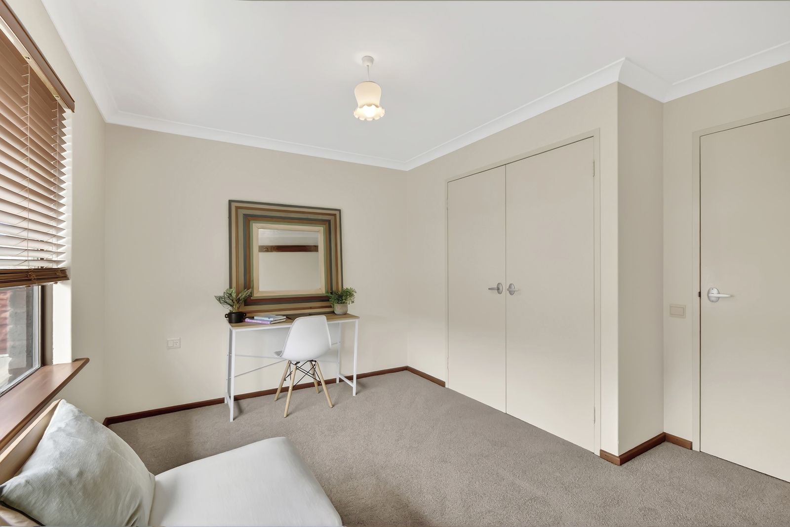 Freshly updated villa with garden views & sunny east-facing balcony