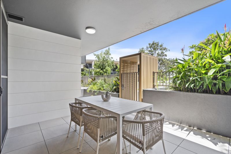 North-facing, ground-floor apartment with direct courtyard access and garden views