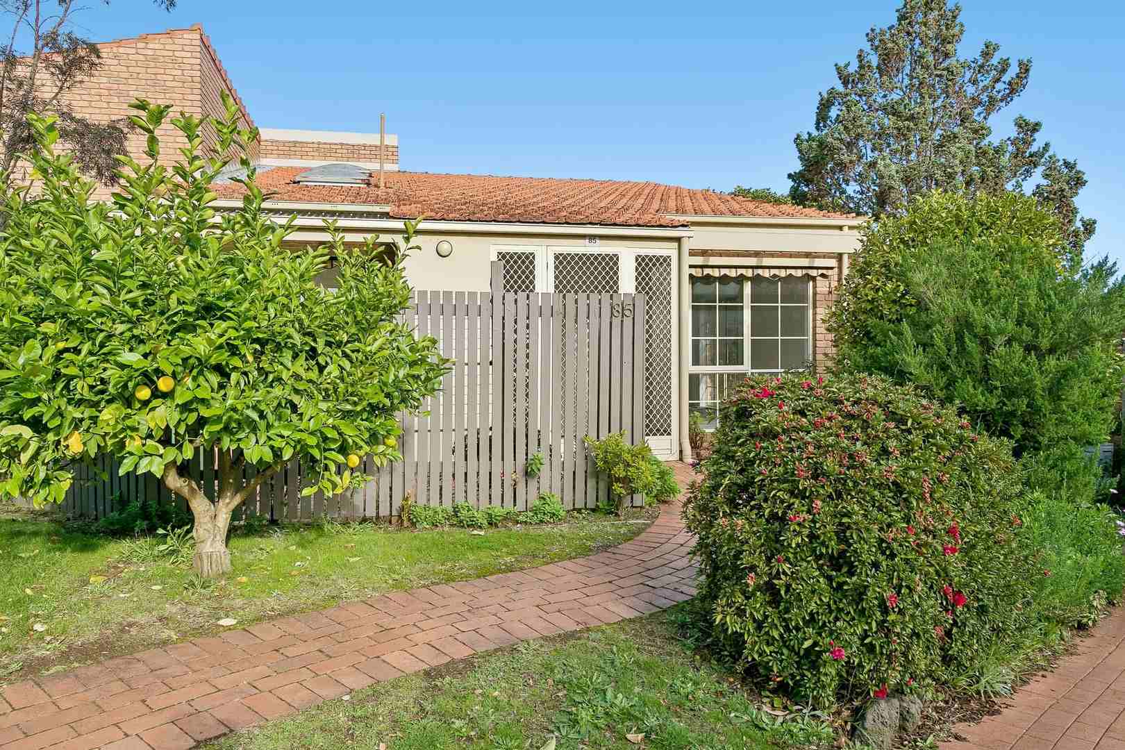 Elegantly Updated and Courtyard Charm