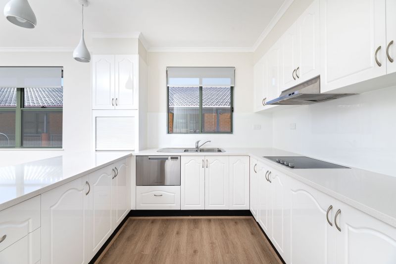 Gorgeous upper level corner apartment