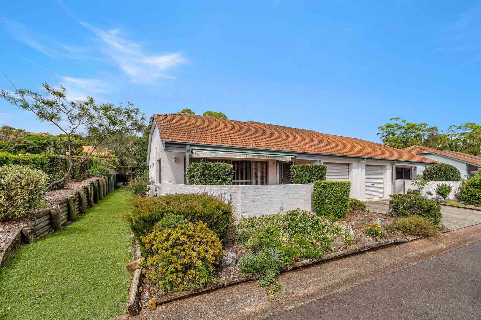 Corner Villa Living Steps from the Village Hub