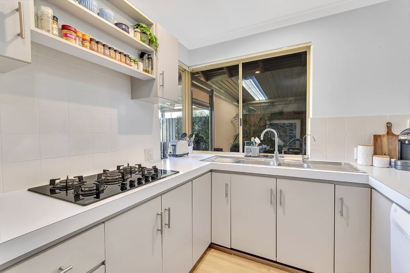 Sunny Yard and Vibrant Village Lifestyle