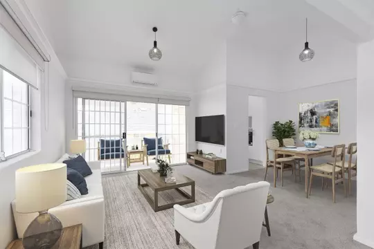 Exquisitely maintained and conveniently located sun-filled unit