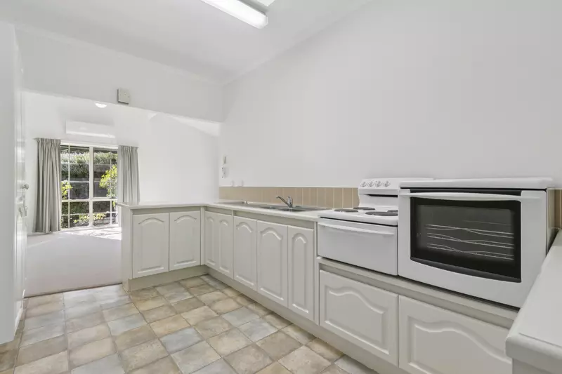 Village Heart Retreat with Vaulted Ceilings and Courtyard