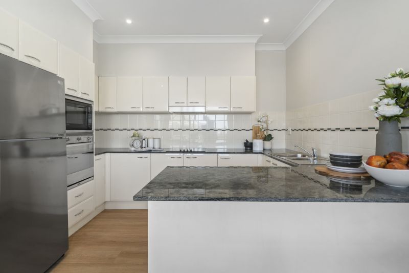 Bright and spacious top floor two-bedroom villa