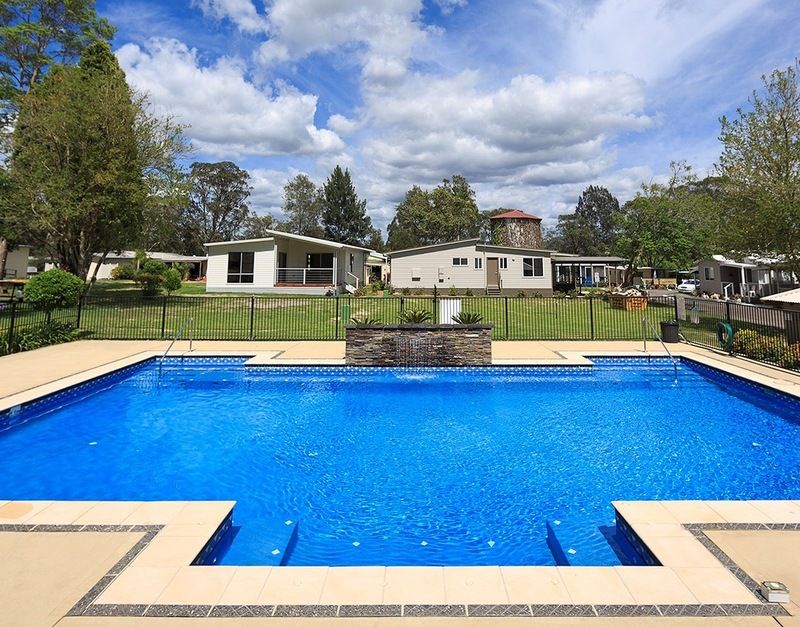 Right Opposite the Pool and Neat as a Pin!