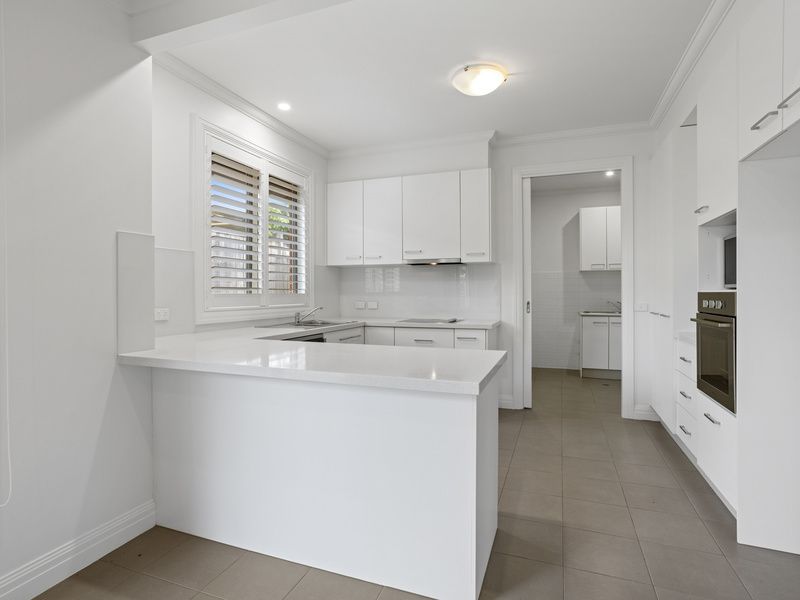 Modern Charm with Vaulted Ceilings and Private Courtyard