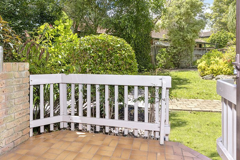 Easy living in this sun filled, ground floor garden apartment.