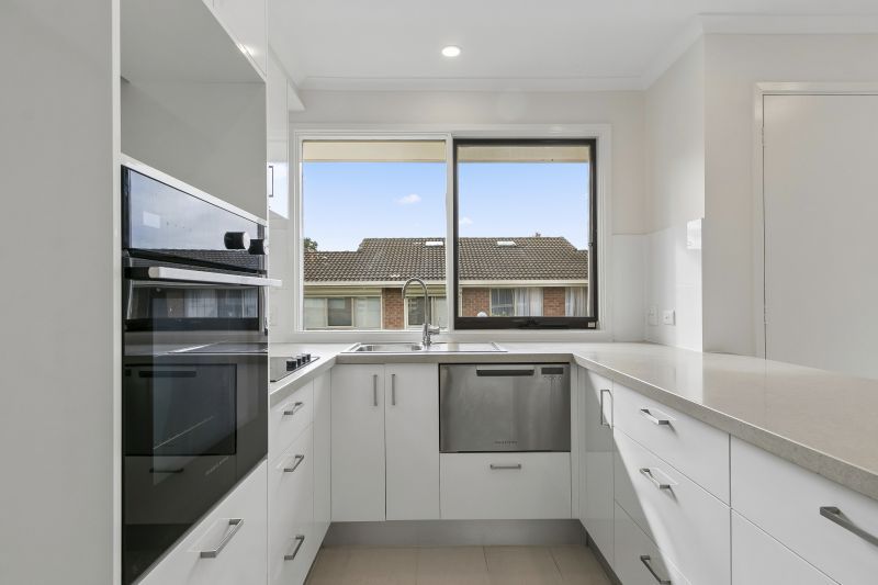 Beautifully presented two-bedroom villa with a charming spacious backyard