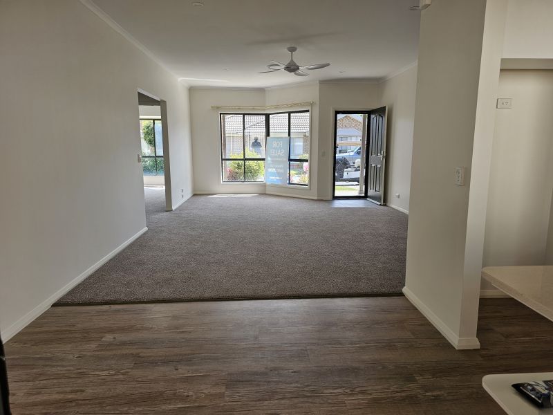 2 Bedroom + Sunroom and QLD room. North facing Lounge.