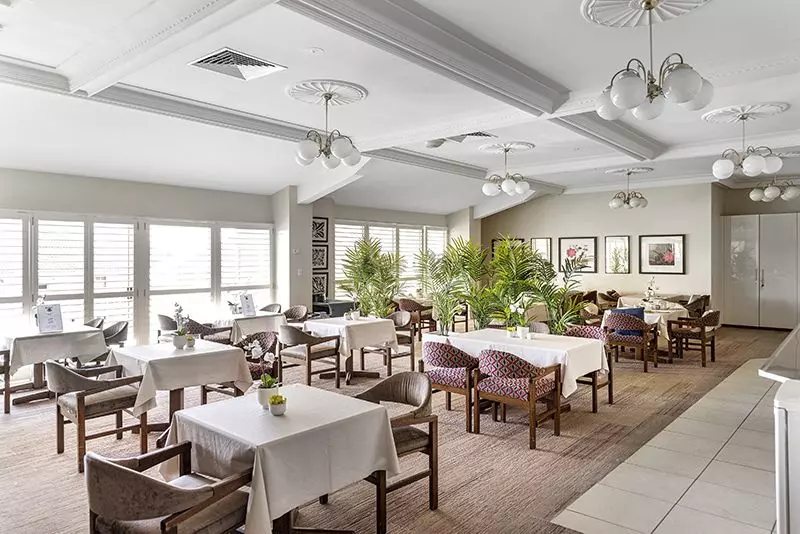 Perfectly located unit overlooking lush, green gardens.