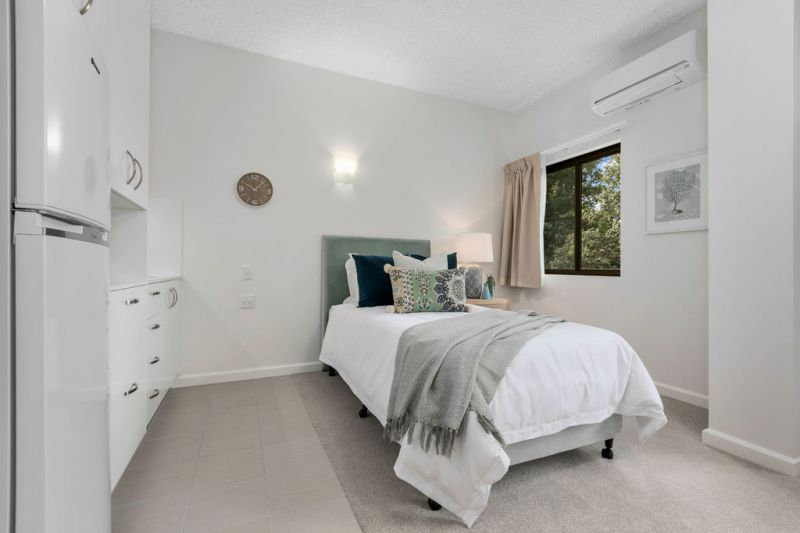 A private forest-view retreat set within a vibrant and highly desirable community.
