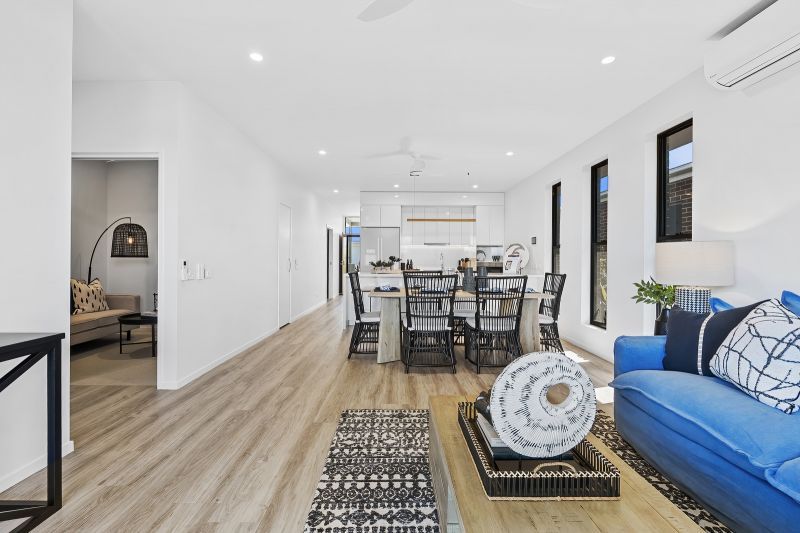 Two-bedroom villa with flexible MPR, designed for relaxed low-maintenance living!