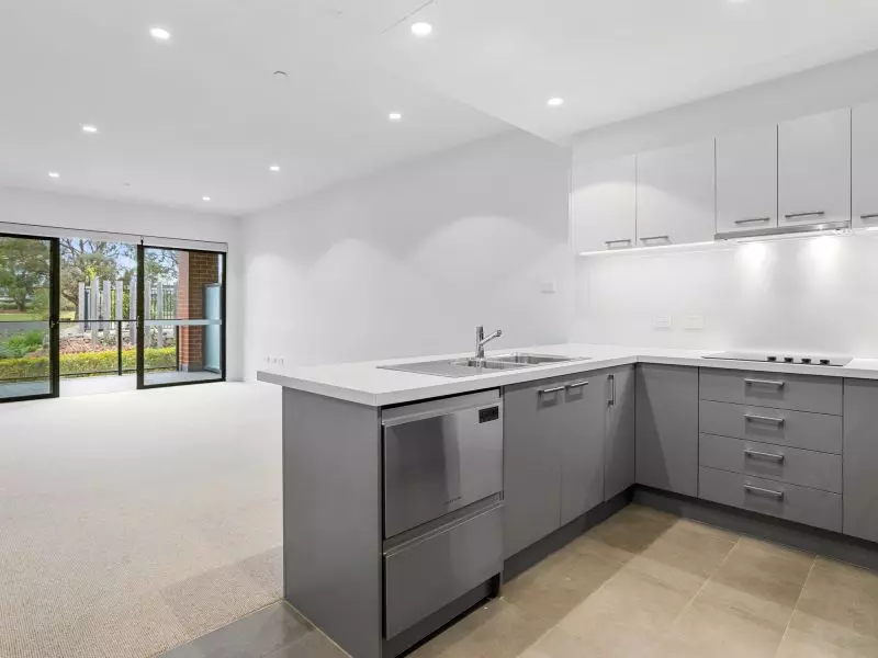 DEPOSIT TAKEN - Light-filled ground floor apartment with lagoon views!