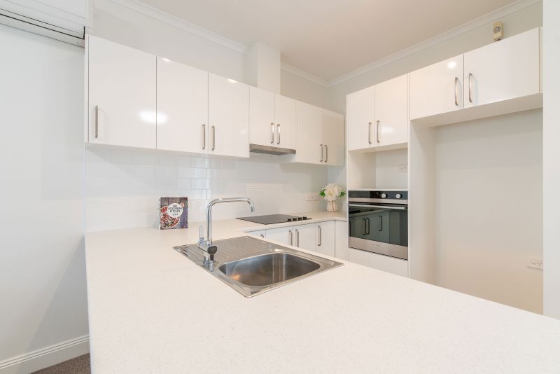 Spacious unit opening onto lovely communal courtyard