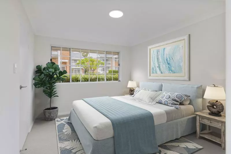An elegant, fully renovated one-bedroom unit overlooking gardens.