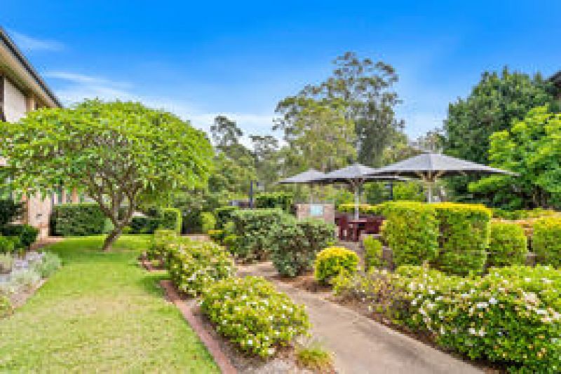 North-facing ground level unit set in enviable park-like surrounds