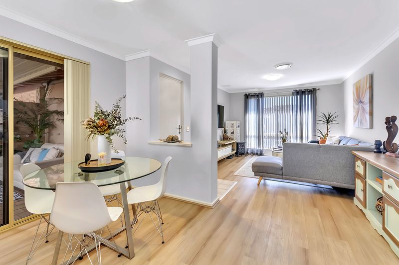 Sunny Yard and Vibrant Village Lifestyle