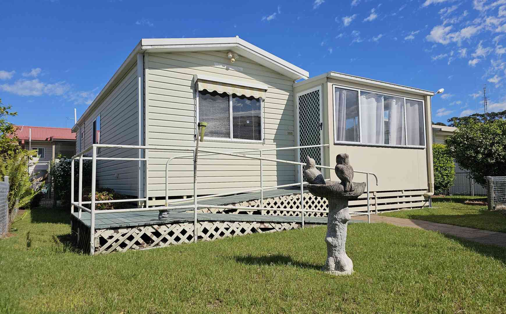 New listing: Discover Your Spacious Oasis: 2-Bedroom Home with Sunroom in a Prime Village Location