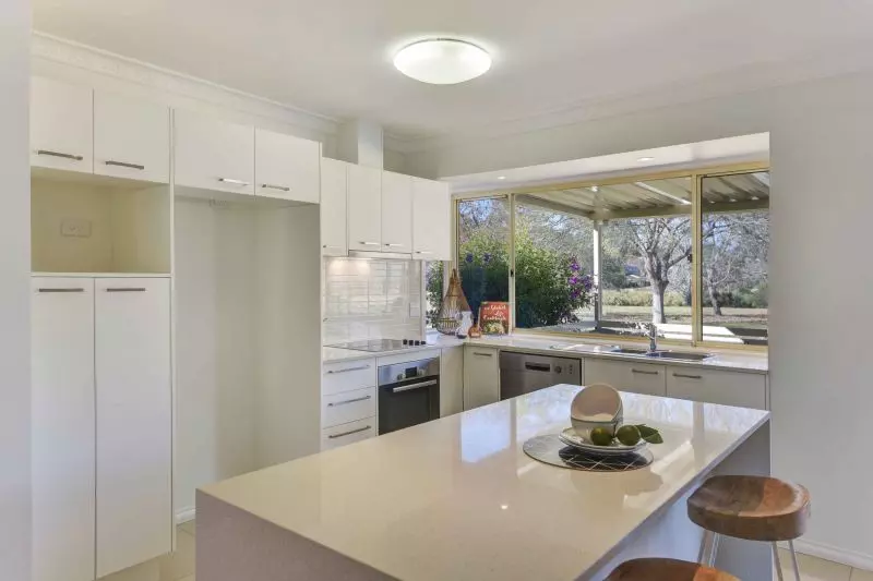 Sit back and relax on your patio! Looking onto the parkland enjoying the lifestyle here at Tarragal Glen!