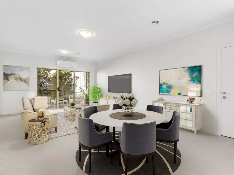 Beautifully Updated Unit with High Ceilings and Convenient Layout