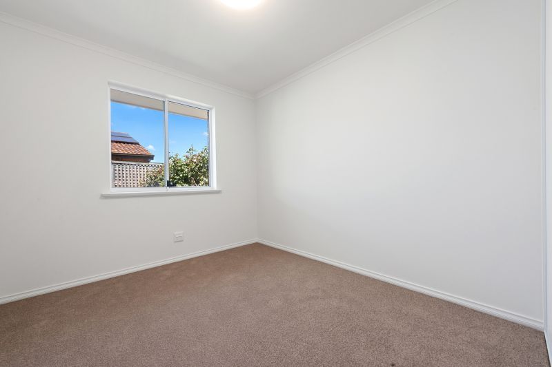 Modern home in tightly-held community