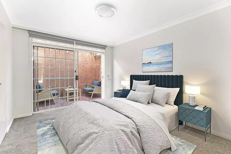 Newly renovated and superbly positioned unit with sunny front terrace and large courtyard.