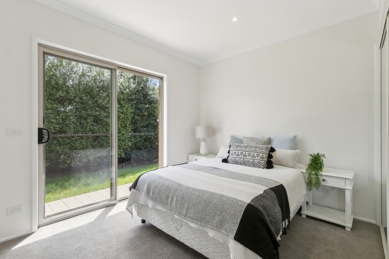 Enjoy serene living in this modern two-bedroom villa
