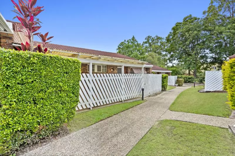 Beautiful two-bedroom, one bathroom villa with covered rear entertaining area.