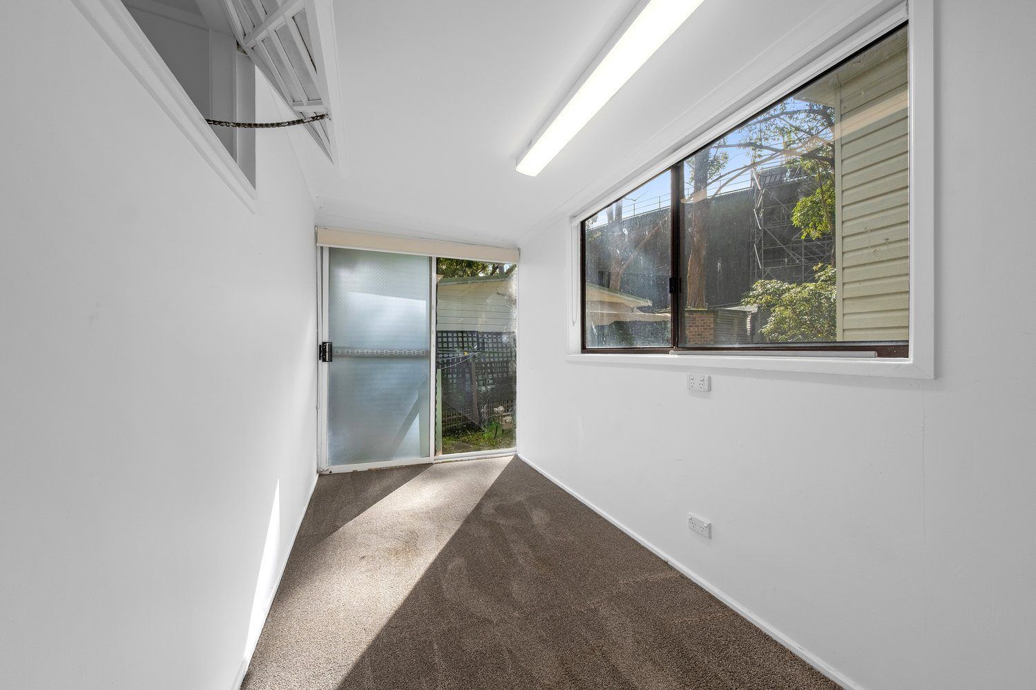 Tranquil Three-Bedroom Home with Sunroom