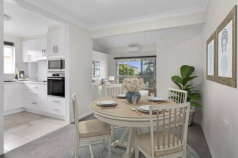 Perfectly located, renovated unit with easy ramp access and lovely district views.