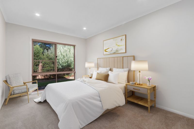 Lovely 2-bedroom villa with paved private courtyard and landscaped gardens