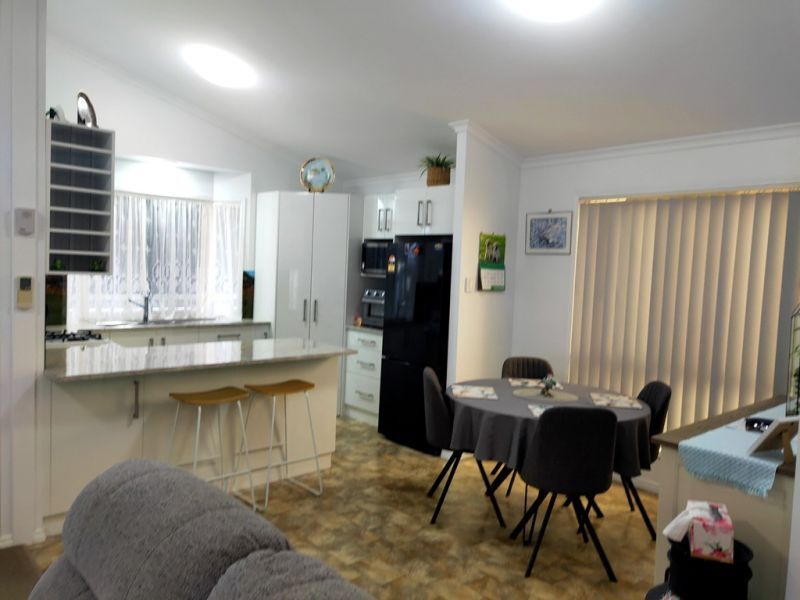 Relaxed Living in a Private Village Oasis