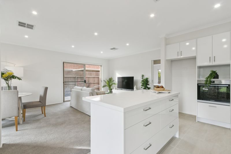 Discover serene living in this fully upgraded two-bedroom villa