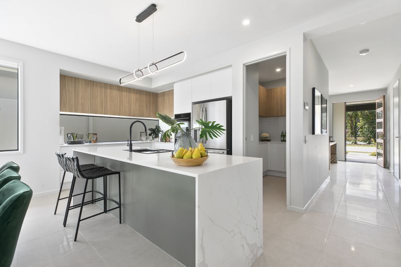 STUNNING DISPLAY HOME FACING TRANQUIL LAKE