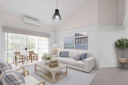 Immaculately maintained upper-level unit with district views and easy access ramp.
