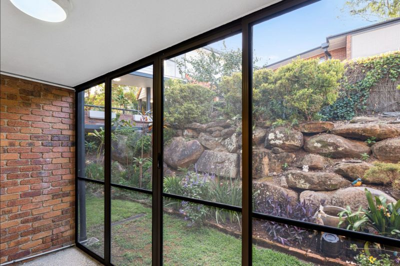 Ground-level studio apartment with enclosed patio