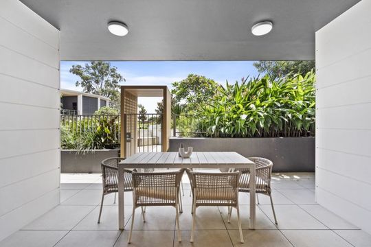 North-facing, ground-floor apartment with direct courtyard access and garden views