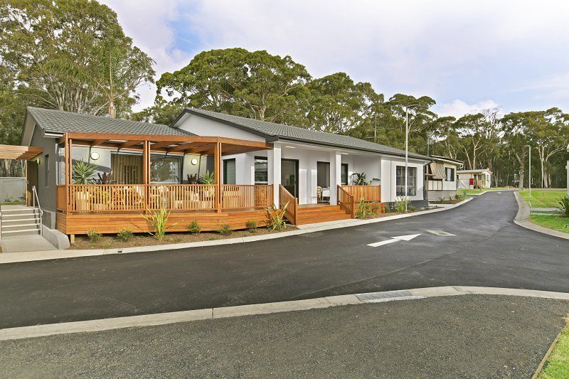 Brand new home nestled by the water’s edge