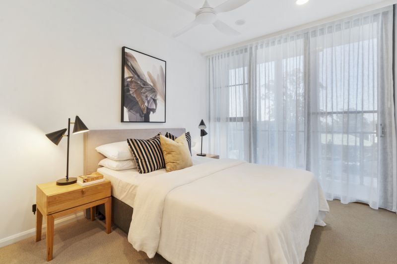 Elegant two-bedroom apartment with peaceful, tree-lined outlooks