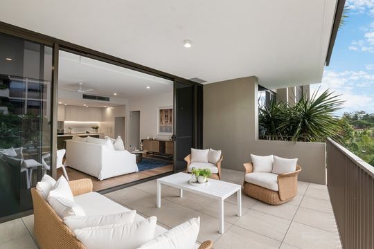 Elevated Living with Beautiful Garden and Lake Outlook.