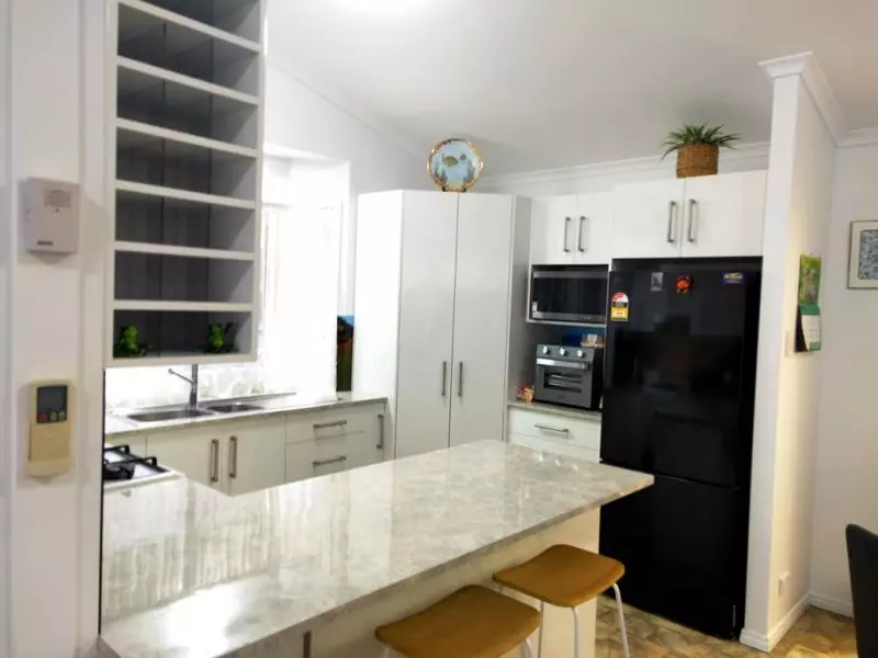 Relaxed Living in a Private Village Oasis