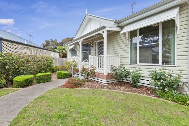 Charming Two-Bedroom Home with Beautiful Gardens